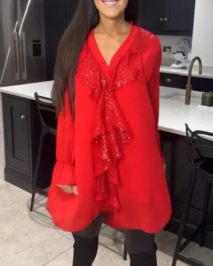 Ksenia – Elegant damebluse med flæsedetaljer