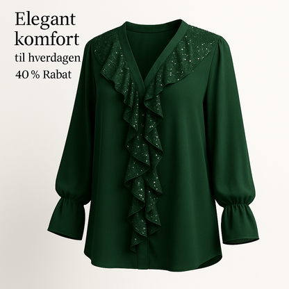 Ksenia – Elegant damebluse med flæsedetaljer