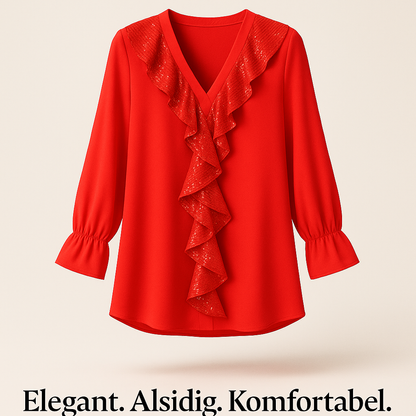Ksenia – Elegant damebluse med flæsedetaljer