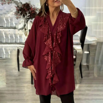Ksenia – Elegant damebluse med flæsedetaljer
