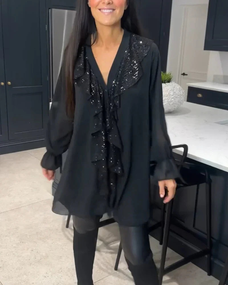 Ksenia – Elegant damebluse med flæsedetaljer